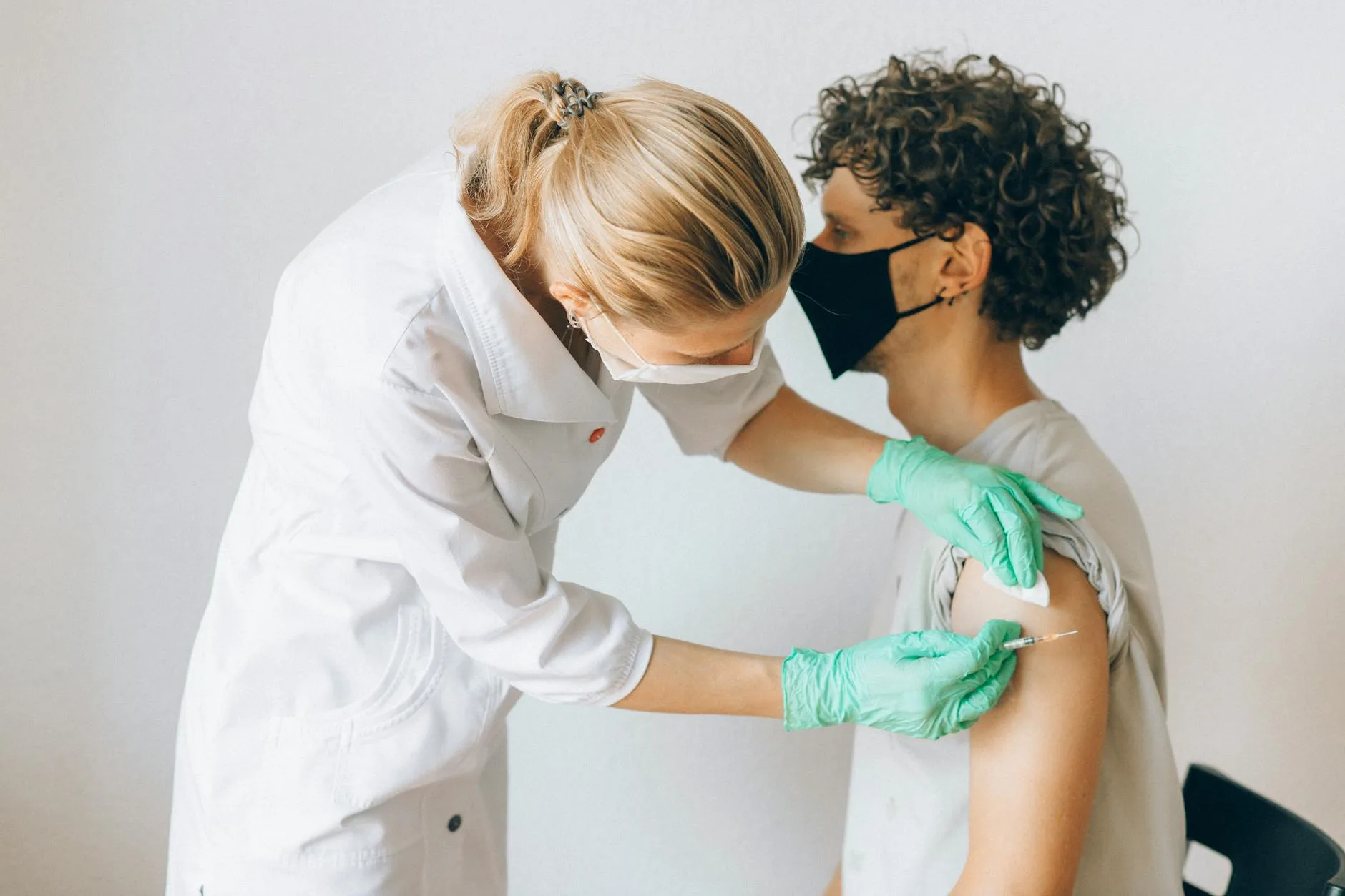 young man getting vaccinated